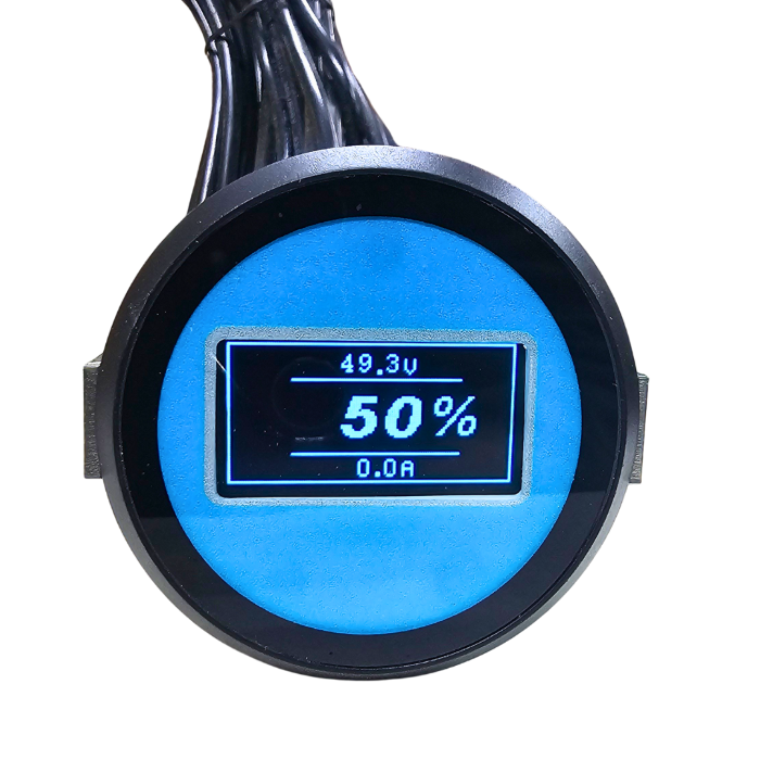 Circular digital gauge with blue display on a white background